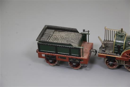 A Marklin electric locomotive and tender, The Fury, loco 5.5in. tender 3.75in. carriages 5.5in.